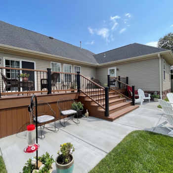 backyard deck with railing stairs