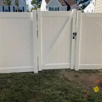 White vinyl fence gate installed