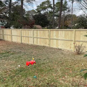 New wooden backyard privacy fence