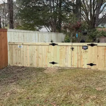 New wooden backyard fence gate