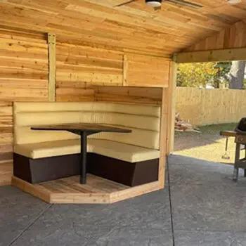 Wood patio enclosure seating area