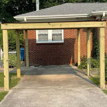 Wood pergola frame over driveway
