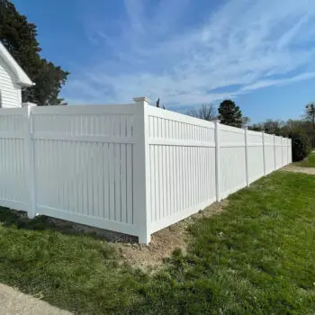 White vinyl privacy fence installation