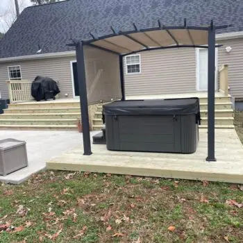 Backyard deck with pergola installation