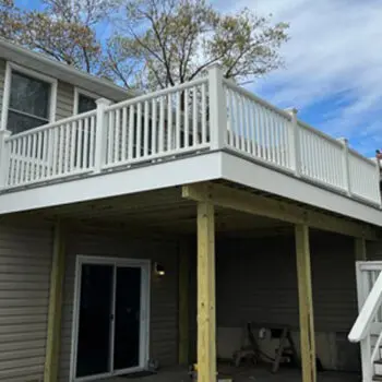 Installing white deck railing outdoors