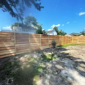 New wooden privacy fence installation