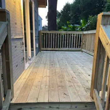 New wooden deck with railing