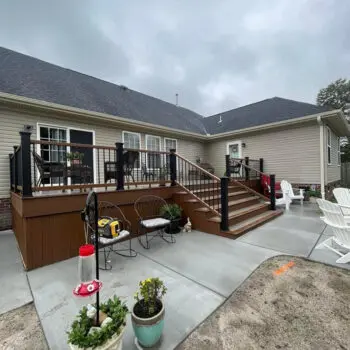 Backyard deck installation with railings