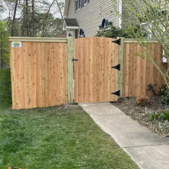 Wood privacy fence with gate
