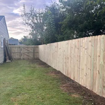 New wooden privacy fence installation