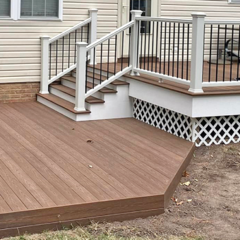 Backyard deck with railing installation